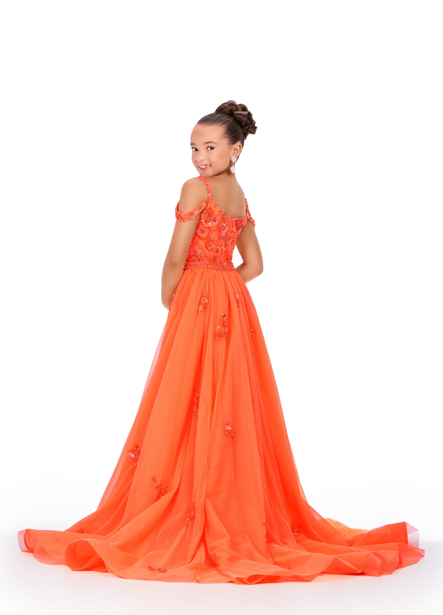 Expertly crafted for little girls who deserve to sparkle, the Ashley Lauren 8239 dress will make her shine on stage. The fitted silhouette flatters any figure while the beaded details and sequin overlay add a touch of glamour. Perfect for pageants and formal events. Bring the drama in this beaded column gown with shoulder draping straps. The removeable tulle overskirt is embellished with scattered beaded accents.