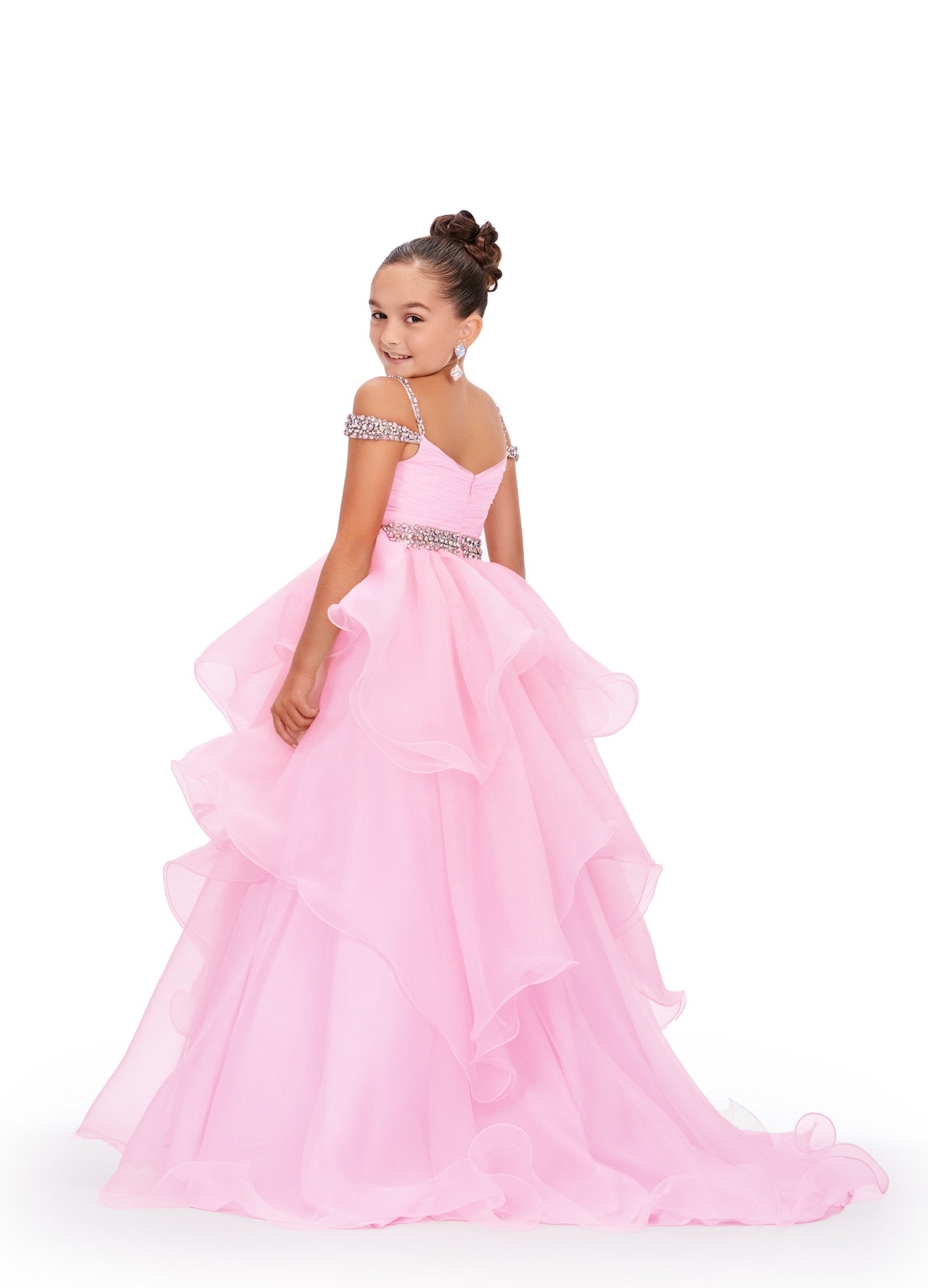 Glam up your little one's pageant look with the Ashley Lauren Kids 8250 A Line Ruffle Dress. This stunning ballgown features a delicate off-the-shoulder neckline, adorned with intricate beading. The ruffled A-line skirt adds a touch of elegance, making your child shine on stage. Perfect for any formal occasion. 