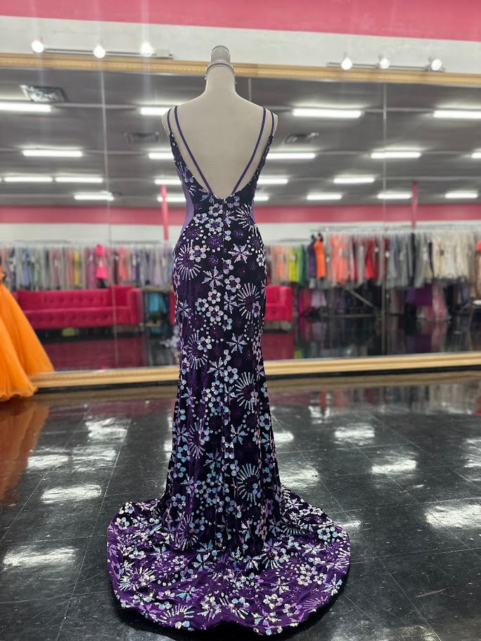 Elevate your evening with the Nina Canacci 8257 prom dress, crafted in rich purple velvet adorned with shimmering sequins. This size 4 mermaid gown features a flattering V-neckline and sheer accents that add a delicate, sophisticated allure. Designed to contour your silhouette gracefully, it’s the perfect choice for a formal event where elegance and style are paramount.

Size: 4

Color: Purple