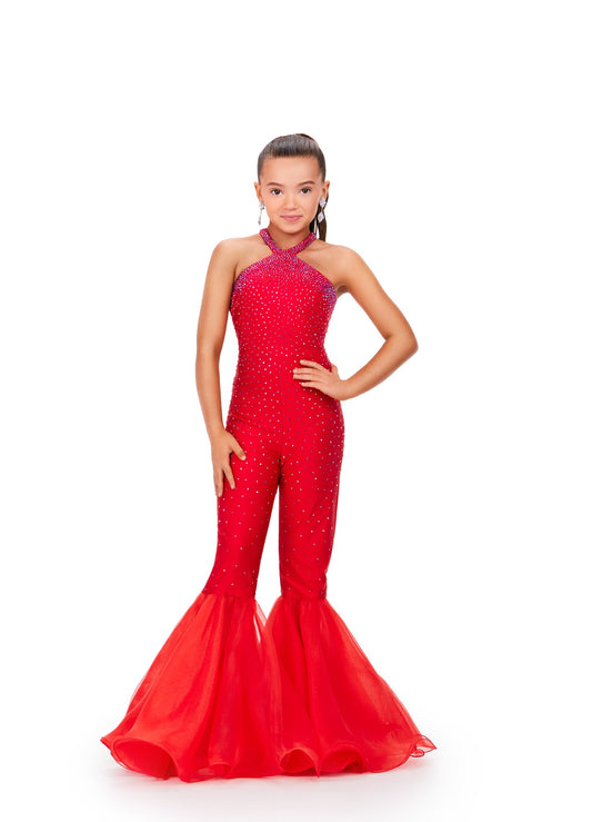 The Ashley Lauren Kids 8265 Girls High Neck Bell Bottom Jumpsuit is a stunning piece designed for pageants. Its high neck and crystal embellishments create an elegant silhouette, while the bell bottom adds a touch of fun. Perfect for standing out on stage, this jumpsuit is a must-have for any young pageant contestant. This super sassy kids jersey jumpsuit features heat set stones throughout and is accented by flared organza bell bottom pant legs.