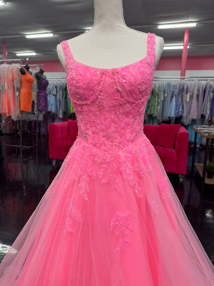 Elevate your evening with the Nina Canacci 8266 ballgown, designed in a vibrant hot pink hue. This size 4 dress features intricate beading that adds a subtle shimmer, enhancing its elegant A-line silhouette. The corset bodice offers a flattering fit, while the scoop neckline and backless design create a graceful, sophisticated look perfect for prom or formal occasions.

Size: 4

&nbsp;Color: Hot Pink
