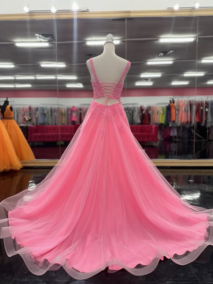Elevate your evening with the Nina Canacci 8266 ballgown, designed in a vibrant hot pink hue. This size 4 dress features intricate beading that adds a subtle shimmer, enhancing its elegant A-line silhouette. The corset bodice offers a flattering fit, while the scoop neckline and backless design create a graceful, sophisticated look perfect for prom or formal occasions.

Size: 4

&nbsp;Color: Hot Pink