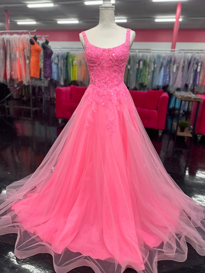 Elevate your evening with the Nina Canacci 8266 ballgown, designed in a vibrant hot pink hue. This size 4 dress features intricate beading that adds a subtle shimmer, enhancing its elegant A-line silhouette. The corset bodice offers a flattering fit, while the scoop neckline and backless design create a graceful, sophisticated look perfect for prom or formal occasions.

Size: 4

&nbsp;Color: Hot Pink