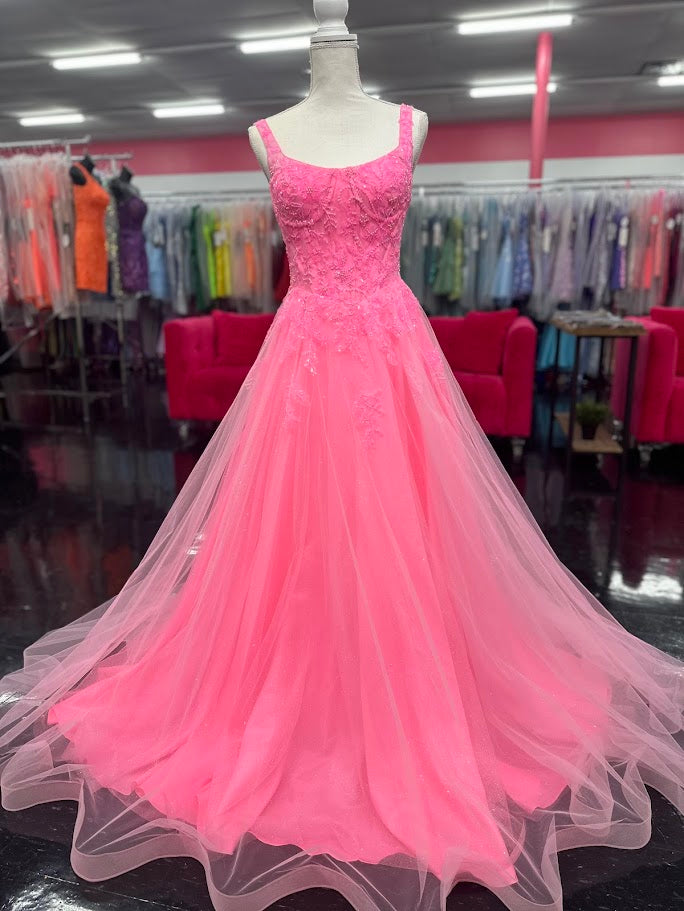 Elevate your evening with the Nina Canacci 8266 ballgown, designed in a vibrant hot pink hue. This size 4 dress features intricate beading that adds a subtle shimmer, enhancing its elegant A-line silhouette. The corset bodice offers a flattering fit, while the scoop neckline and backless design create a graceful, sophisticated look perfect for prom or formal occasions.

Size: 4

&nbsp;Color: Hot Pink