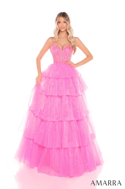 Experience luxury and elegance in the Amarra 88345 Ballgown. This stunning dress features sheer beaded corset detailing and layers of flowing fabric, creating a show-stopping look. Perfect for prom, pageants, or any formal event, this dress will make you feel like royalty.

Sizes: 000-16

Colors: Hot Pink,&nbsp;Ivory,&nbsp;Light Blue,&nbsp;Periwinkle,&nbsp;Red