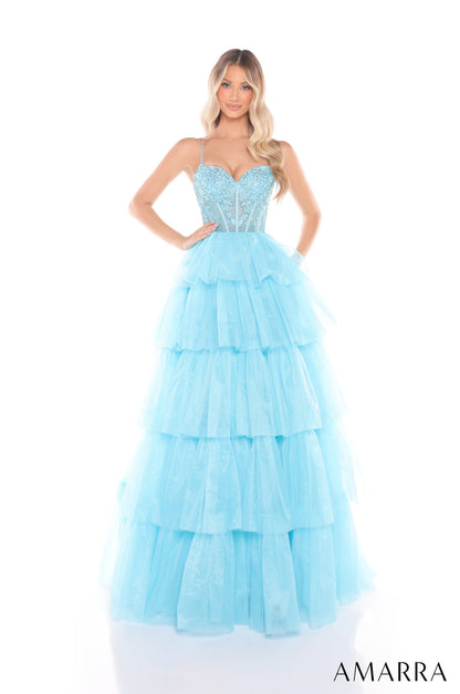 Experience luxury and elegance in the Amarra 88345 Ballgown. This stunning dress features sheer beaded corset detailing and layers of flowing fabric, creating a show-stopping look. Perfect for prom, pageants, or any formal event, this dress will make you feel like royalty.

Sizes: 000-16

Colors: Hot Pink,&nbsp;Ivory,&nbsp;Light Blue,&nbsp;Periwinkle,&nbsp;Red