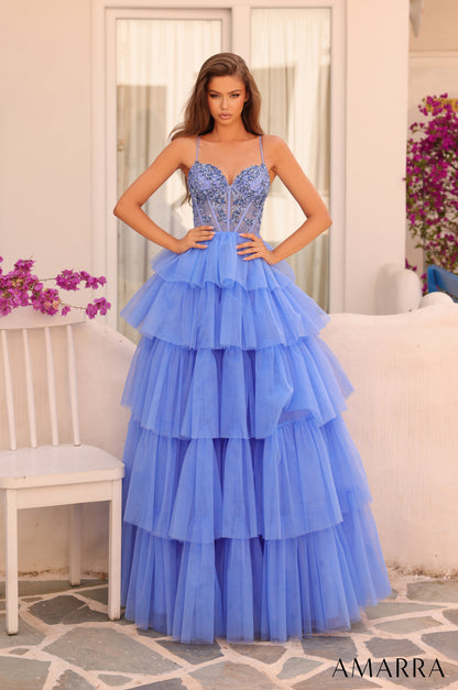 Experience luxury and elegance in the Amarra 88345 Ballgown. This stunning dress features sheer beaded corset detailing and layers of flowing fabric, creating a show-stopping look. Perfect for prom, pageants, or any formal event, this dress will make you feel like royalty.

Sizes: 000-16

Colors: Hot Pink,&nbsp;Ivory,&nbsp;Light Blue,&nbsp;Periwinkle,&nbsp;Red