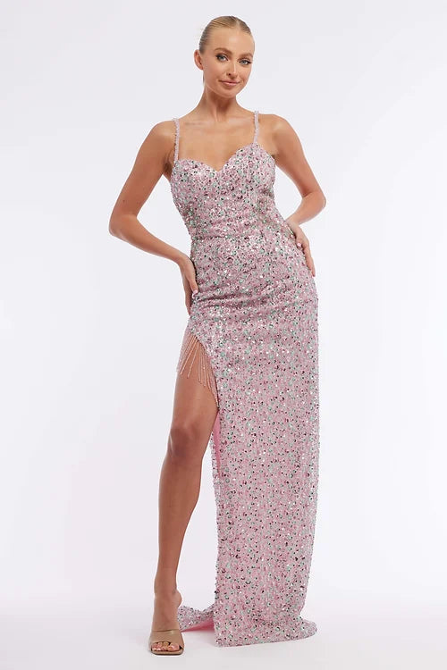 Look stunning in our Vienna Prom 8874 Long Prom Dress! This sequin fitted gown features a sweetheart neckline, high slit, and fringes that add a touch of glamour. Perfect for formal occasions and pageants, this gown will have you standing out with its unique design.