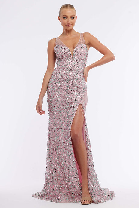 This Vienna Prom 8875 long prom dress is a stunning choice for your formal event. With a fitted silhouette, sequin detailing, and a sheer open back, it exudes elegance and sophistication. The slit adds a touch of glamour, making you feel confident and beautiful. Perfect for prom or a pageant.