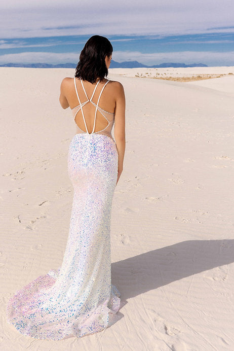 Step onto the red carpet in style with the Vienna Prom 8880 Long Prom Dress. This stunning gown features a sequin-embellished fitted silhouette, with a sheer plunging neckline and sheer sides that add a touch of sexiness. Perfect for formal events and pageants, this dress is sure to make you stand out from the crowd.