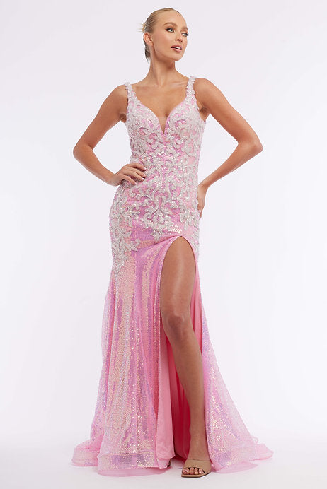 Expertly designed for elegance and sophistication, the Vienna Prom 8882 Long Prom Dress is a show-stopping gown. With a fitted V-neckline and dazzling sequin detailing, this gown exudes confidence and allure. The stunning train and thigh-high slit add a touch of drama, making it the perfect choice for formal events and pageants.