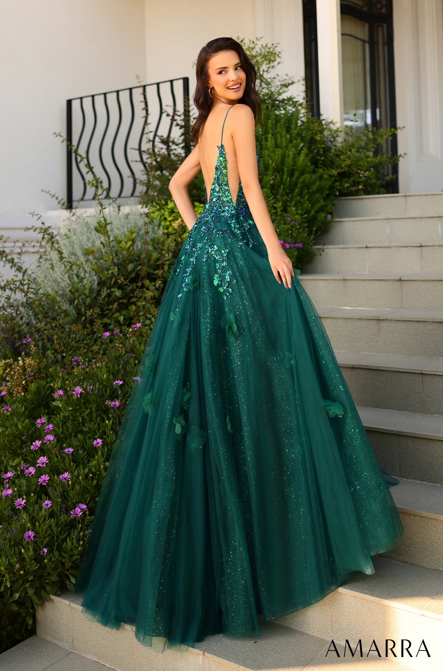 This Amarra 88857 dress is the perfect addition to any formal event. With a long, sheer sequin A-line cut, and a backless design, it's sure to turn heads. The elegant and sophisticated style will make you stand out in any pageant or prom. This sparkling A-line prom dress is a fairy tale dream come true!