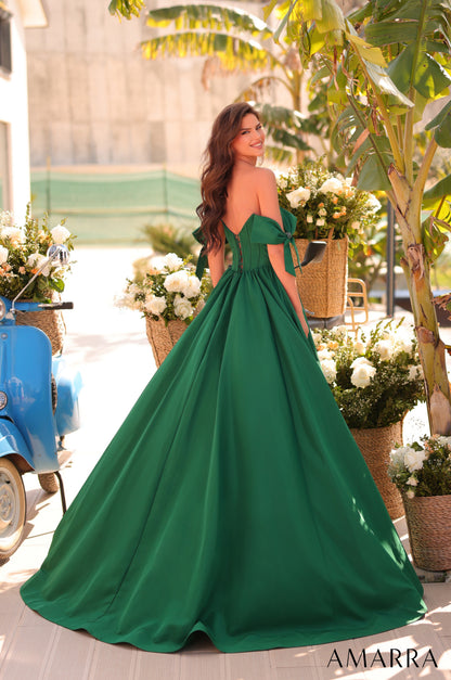 The Amarra 88995 Long A-Line Prom Dress features an elegant off-the-shoulder design accented with delicate bows that enhance its femininity. Its fitted corset bodice flawlessly sculpts the waist, while the plunging neckline adds a daring touch of sophistication. The flowing A-line skirt provides graceful movement and a flattering silhouette, making this gown ideal for formal occasions where both comfort and style are essential. Crafted to balance classic charm with modern elegance, this dress is a refined c