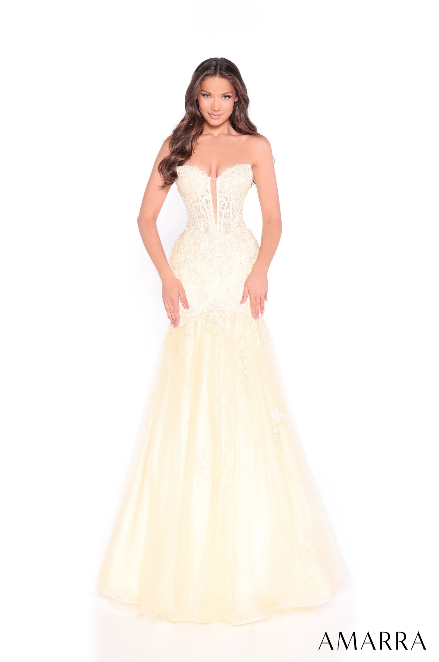 Make a stunning entrance in the Amarra 89319 Lace Corset Mermaid Prom Dress. This elegant strapless gown features intricate lace detailing on a structured corset bodice that flatters your silhouette. The dramatic mermaid skirt flows gracefully into a sweeping train, perfect for prom, pageants, and formal events. The sophisticated design combines timeless elegance with modern glamour, ensuring you'll feel confident and radiant all night long.

Sizes: 000-16

Colors: Fuchsia, Lilac, Yellow