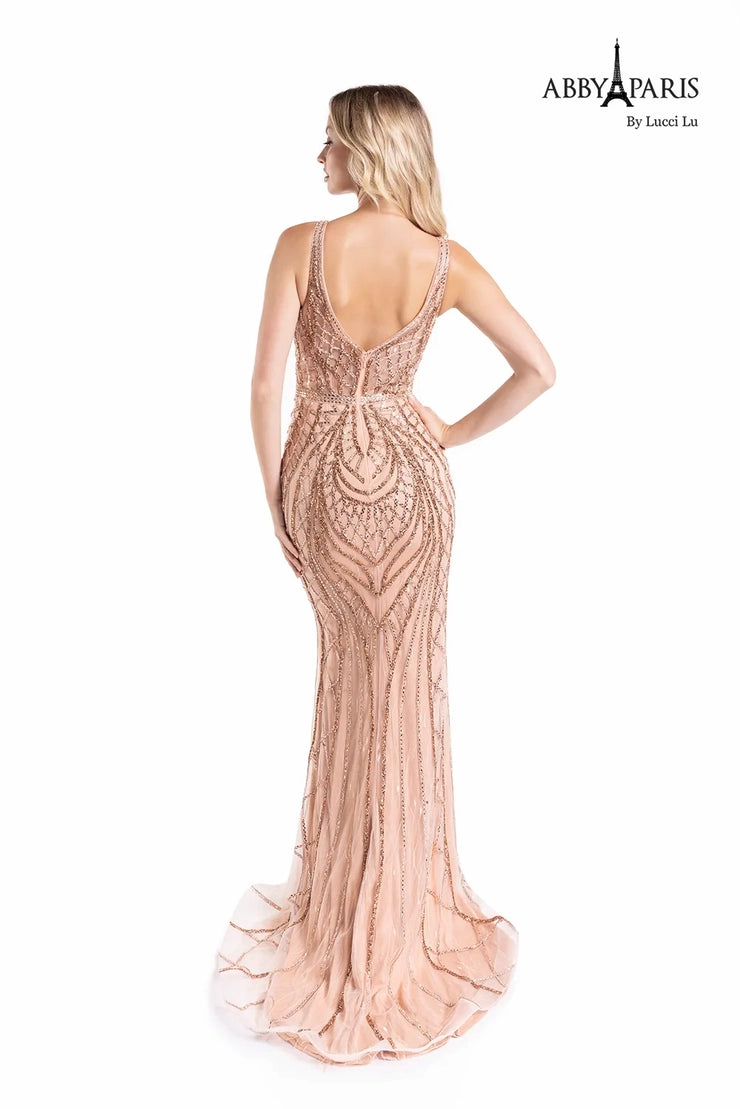 The Abby Paris 90156 prom dress is a standout piece for any special event. This fit and flare silhouette showcases a plunging neckline and beautiful embroidery with an elegant tulle overlay. Show up in style at your next event with this stunning long dress.
