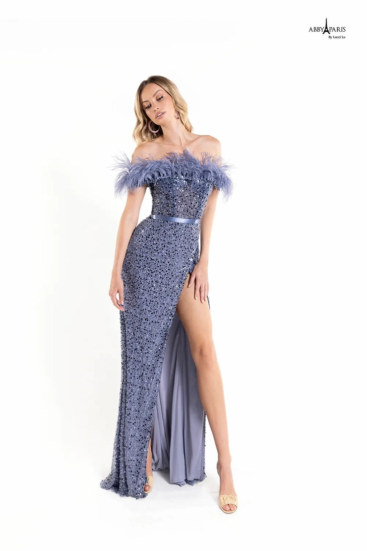 Abby Paris 90170 Off The Shoulder Feather Neckline Fit And Flare Embroidered Tulle Slit Long Prom Dress. Look spectacular in the Abby Paris 90170 Prom Dress. This elegant off the shoulder design features a stylish feather neckline, fit and flare silhouette, and intricate floral embroidery on a soft tulle base. It is completed with a thigh-high slit to show off your legs. Perfect for prom or any special occasion.