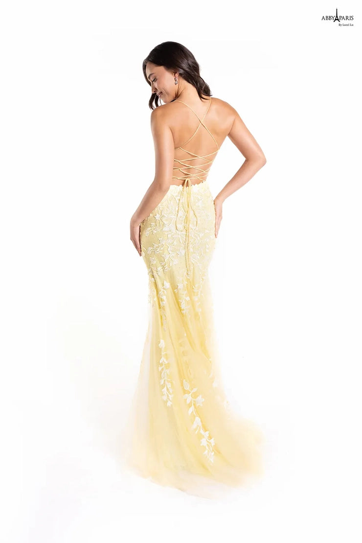 The Abby Paris 90171 dress is a stunning option for your next formal event. Crafted with exquisite embroidered tulle and featuring a fit and flare silhouette, you will turn heads. The unique lace up back adds a modern touch, for a contemporary look.