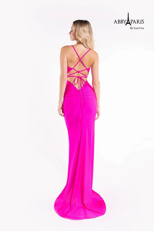 This elegant Abby Paris 90173 prom dress has an exquisite cowl neckline and a beautiful lace up back. It's constructed with a fit and flare silhouette and a long train for a dramatic look. Perfect for your special occasion.