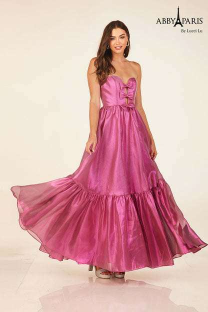 Expertly crafted in shimmering metallic fabric, the Abby Paris 90291 A Line Prom Dress is the epitome of elegance and grace. With a dramatic slit and charming bow detail at the V-neckline, this formal gown is perfect for any special occasion. Turn heads and make a statement in this stunning design.

Sizes: 0-14

Colors: Fuchsia, Tie Dye