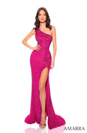 Amarra 94017 The one shoulder sequin long dress with a high slit and a beautifully detailed back is nothing but dazzling. All through the dress, especially at the edges and the neckline, crystallized fur bordered by oval sequins accentuate the dress, making it even more stunning. But if that will not catch everyone’s eye, then the high slit, reaching up to mid-thigh, and the mesh-shaped back straps that flow along the lower back and through the flare of the dress will.