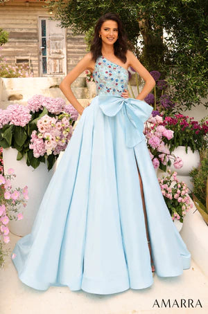 Amarra 94041 This dress is the pure definition of go big or go home, or in this case, go big at prom or stay home. The fitted bodice with one shoulder is splendidly resplendent with rhinestone crystals of various intriguing colors - blue, red, light yellow, green, orange - beaded into the linen. This dazzling bodice seamlessly transitions into a silken tulle skirt that flows down the floor in one graceful wave and a big gorgeous bow sits on the waistline, accentuating the glamorous look.