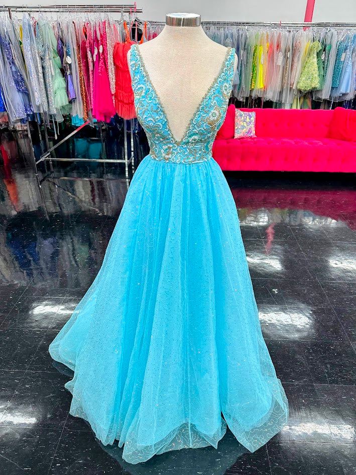 This elegant Amarra 94052 dress is adorned with intricate beading and sequins, featuring a V neck and A line cut that beautifully accentuates your figure. The delicate tulle train adds a touch of sophistication to this show-stopping prom or pageant gown. Make a lasting impression with this stunning ballgown.&nbsp;The Ball Gown with a V-back Dress is crafted with luxurious tulle fabric giving it an elegant feel. Its ball-gown silhouette is designed to complement different body types, providing a look. The ne