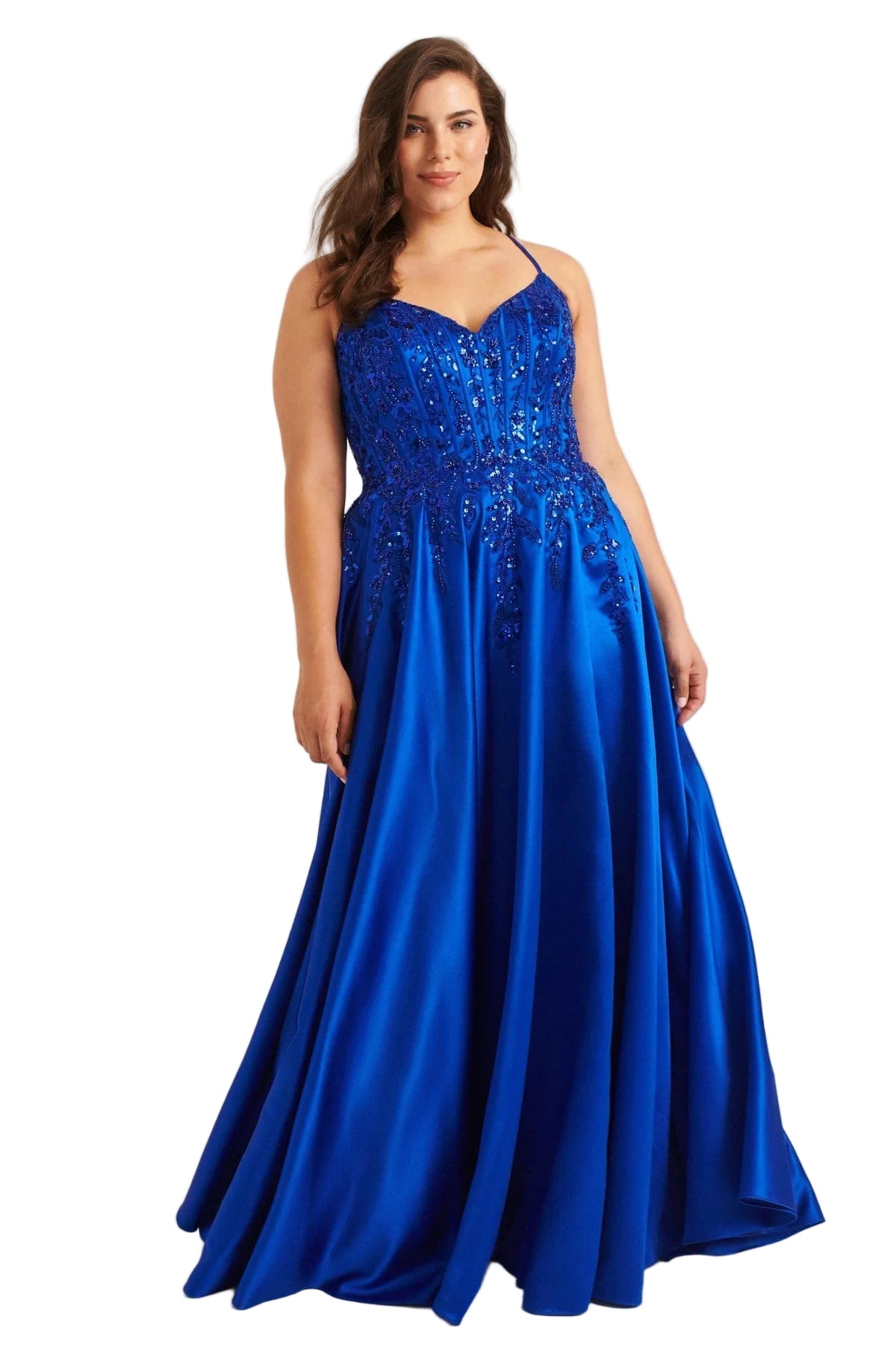 Turn heads with the Faviana 9575, a bold plus-size prom gown designed to captivate. This royal satin dress features a structured corset top adorned with shimmering sequins and delicate lace, accentuating your curves with confidence. Functional pockets add modern ease without sacrificing glamour, making it perfect for those who dare to shine all night. Step into this statement piece and own every moment of your formal occasion.

Size: 20W

Color: Royal