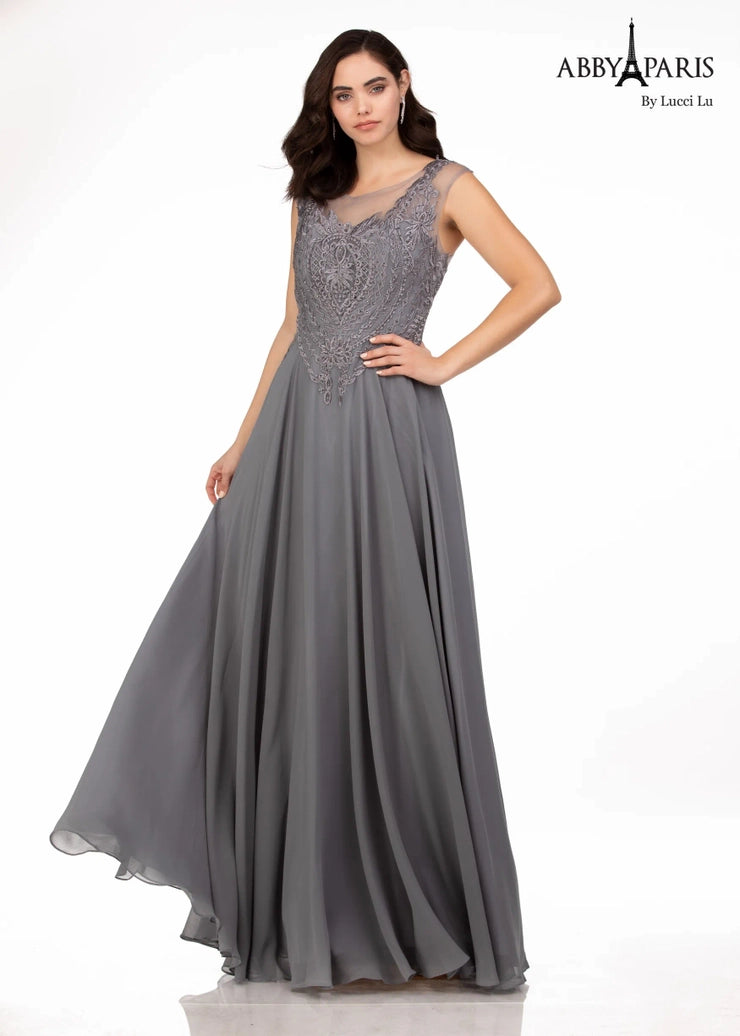Abby Paris 96051W A-Line Chiffon Crew Neck Short Sleeve Embellished Bodice MOB Formal Gown. The Abby Paris 96051W A-Line Gown features a beautiful chiffon fabrication with a crew neck short sleeve top and an embellished bodice for an elegant look. Perfect for any formal occasion, this gown will make a statement and leave you feeling gorgeous.