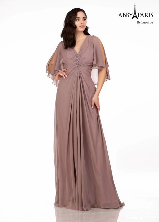 Abby Paris 96054W A-Line Chiffon V-Neck Plus Size MOB Formal Dress is perfect for making a statement on special occasions. Featuring an A-line silhouette, V-neckline, and chic chiffon fabric, this dress flatters any figure and is designed for lasting wear. Plus size options available.