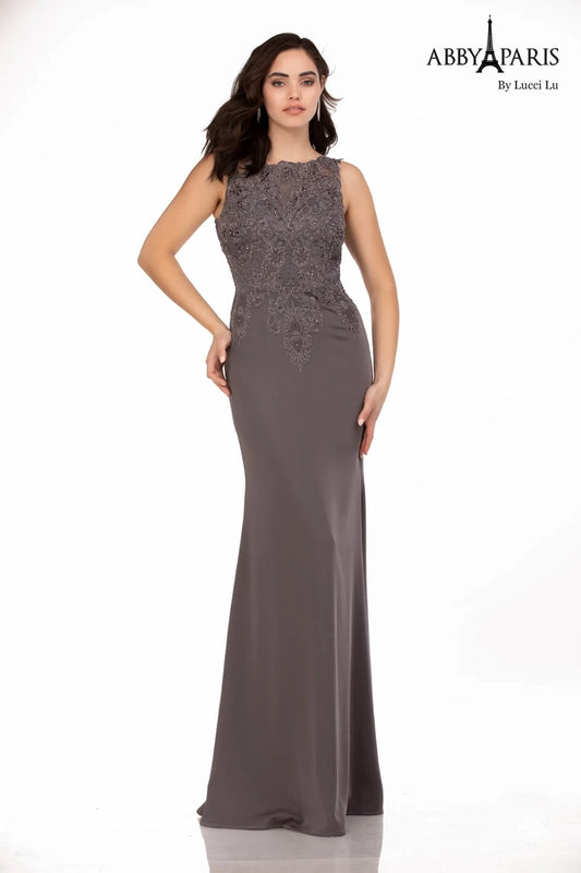 Abby Paris 96061W Lace Bodice Stretch Crepe A-Line High Neck Plus Size MOB Formal Gown. Glam up your special occasion with the Abby Paris 96061W Lace Bodice Stretch Crepe A-Line High Neck Plus Size MOB Formal Gown. This beautiful dress is designed with a lace bodice made of stretch crepe for a comfortable fit and features a high neck, A-Line silhouette, and beaded waist. Perfect for weddings or formal events.