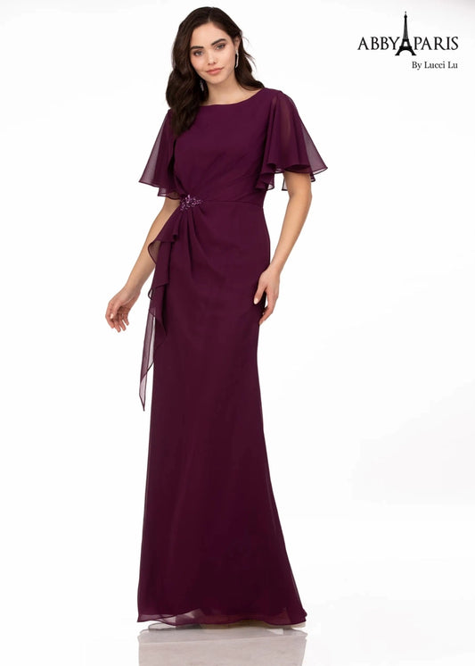 Exude elegance and style at your special occasion in the Abby Paris 96066 A-Line Gown. This floor-length chiffon gown features a draped sleeve, subtle crystal detailing, and a timeless A-Line silhouette. A timeless and classic look perfect for any mother of the bride or groom