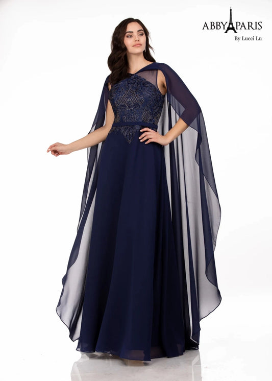 Abby Paris 96067 A-Line Embellished Bodice Sheer Cape V-Back High Neck MOB Formal Gown. The Abby Paris 96067 Gown boasts a timeless and elegant A-Line silhouette that will flatter any figure. The embellished bodice and sheer cape add a hint of sparkle, while the high neck and V-Back give a striking look. Perfect for any formal event.
