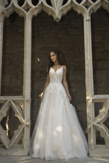 Elevate your bridal elegance with the Abby Lane 97103 gown, a stunning size 6 ballgown in ivory champagne. Featuring delicate lace detailing and a flowing tulle A-line silhouette, this dress combines timeless sophistication with romantic charm. Perfect for the bride seeking graceful movement and classic beauty on her special day.

Size: 6

Color: Ivory/Champagne