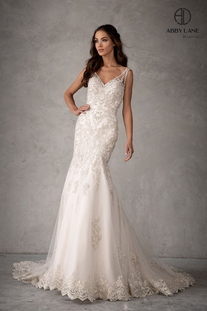 This Abby Lane wedding dress in sizes 4 and 12 features an elegant ivory champagne lace design that beautifully contours the body with a mermaid fit and flare silhouette. Delicate buttons add a refined touch to this sophisticated bridal gown, perfect for a timeless and graceful wedding day look.

Size: 4, 12

Color: Ivory/Champagne