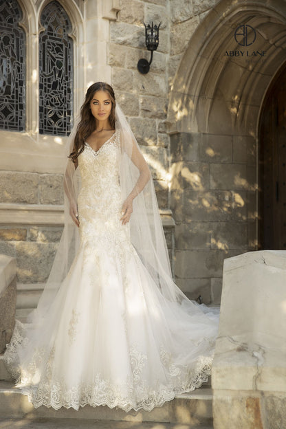 This Abby Lane wedding dress in sizes 4 and 12 features an elegant ivory champagne lace design that beautifully contours the body with a mermaid fit and flare silhouette. Delicate buttons add a refined touch to this sophisticated bridal gown, perfect for a timeless and graceful wedding day look.

Size: 4, 12

Color: Ivory/Champagne