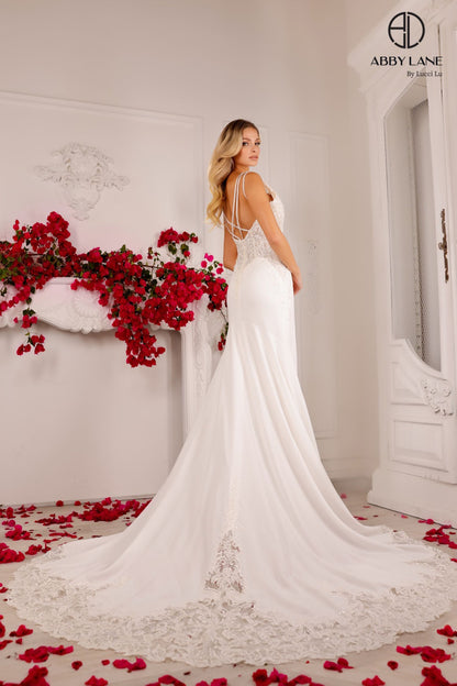 This exquisite Abby Lane wedding dress in size 4 features a delicate ivory satin base adorned with intricate sequin lace and sheer beaded detailing. The gown’s elegant design combines timeless sophistication with subtle sparkle, creating a graceful silhouette perfect for a memorable bridal look. Ideal for brides seeking refined beauty and understated glamour on their special day.

Size: 4

Color: Ivory