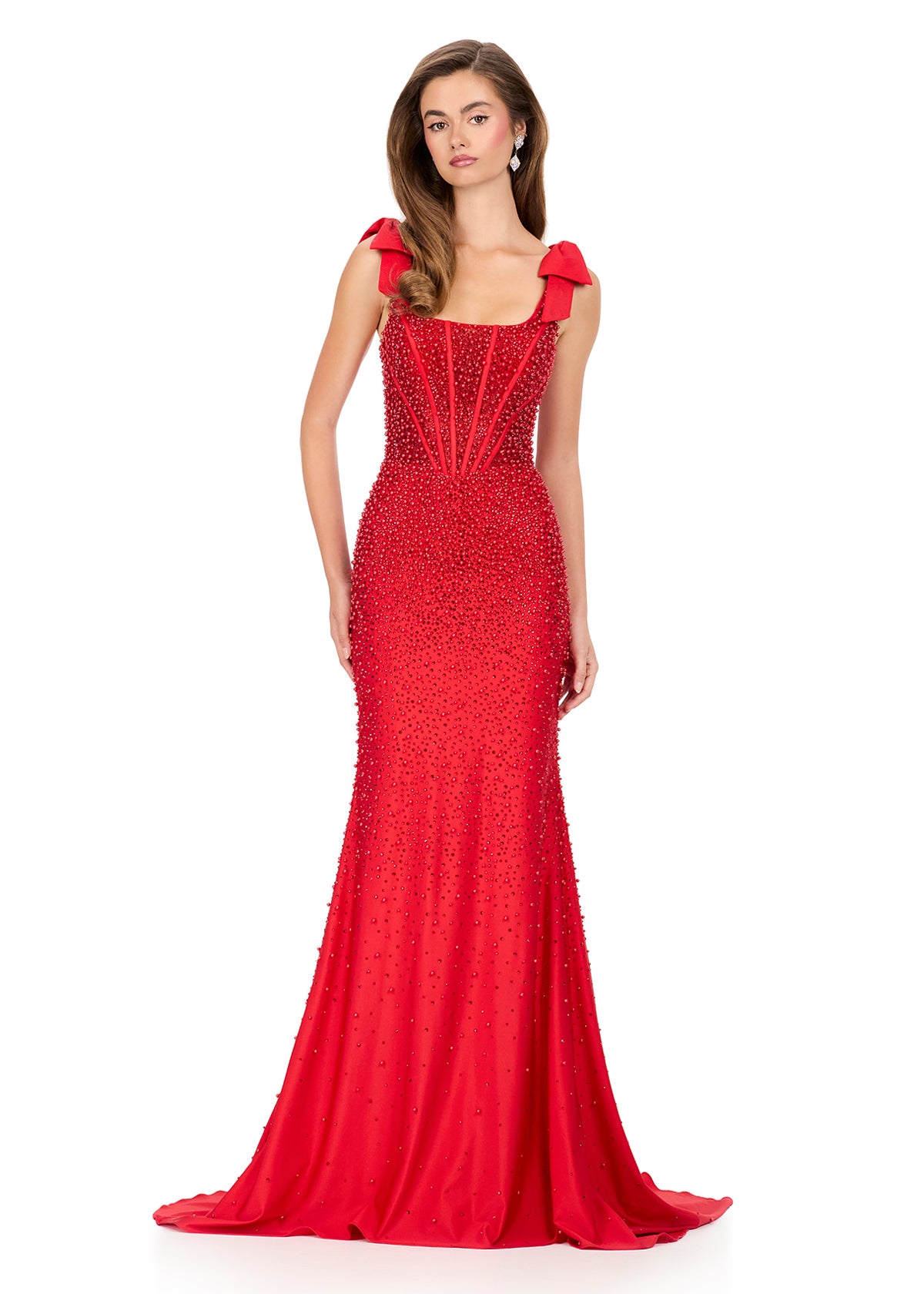 Make them stop and stare in this stunning ASHLEYlauren Style 12179 pearl jersey gown. This fitted dress features elegant bow shoulder straps, a flattering square neckline, and a v-back for a touch of sophistication. The intricate beadwork cascades beautifully down the gown, highlighting your figure and finishing with a dramatic sweep train—perfect for prom, pageant, or evening events.

Available in Red, Sky, White, Ice Pink, and Black
Perfect for Galas, Black Tie Formals, Prom, and Special Occasions
Fitted 