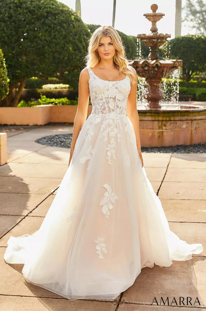 Amarra Bridal "Amanda" Ballgown Scoop Neck Sheer Floral Corset Train Wedding Gown. Look and feel like the belle of the ball in this gorgeous wedding dress. Amanda is fitted at the waist and flares out into a wide skirt, creating the look of a classic ball gown. The square neckline gives the dress tons of flair and adds a delicate, dainty touch