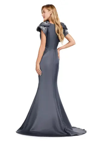 Elevate your evening look with the Ashley Lauren 11415 Charcoal Long Evening Mermaid Dress. This stunning gown features a double-faced satin fabric and intricate bow detail, perfect for a formal event or pageant. Embrace timeless elegance and make a statement with this expertly crafted dress. Make an entrance in this double faced satin gown complete with bow shoulders and beaded details. in this memorable dress styled with radiant beading on the layered shoulder straps.