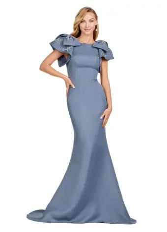 Elevate your evening look with the Ashley Lauren 11415 Long Evening Mermaid Dress. This stunning gown features a double-faced satin fabric and intricate bow detail, perfect for a formal event or pageant. Embrace timeless elegance and make a statement with this expertly crafted dress. Make an entrance in this double faced satin gown complete with bow shoulders and beaded details. in this memorable dress styled with radiant beading on the layered shoulder straps.