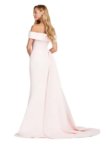 This Ashley Lauren 11425 Long Evening Dress is the perfect choice for any formal occasion. The off-shoulder design adds a touch of elegance, while the fitted satin fabric hugs your figure for a flattering silhouette. The overskirt adds a dramatic flare, making you feel like a pageant queen. Elevate your style with this versatile and stunning dress. An elegant off the shoulder neckline drapes the shoulders in elegant evening gown. The look is complete with beaded details and a side overskirt.