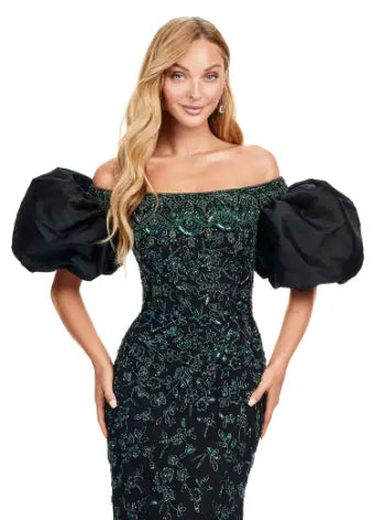 Make a statement with the Ashley Lauren 11432 black evening dress. Sparkling beads cover this off shoulder gown, featuring puff sleeves for a touch of drama. Perfect for formal events and pageants. Expertly crafted with quality materials for a luxurious feel. This fully beaded gown features taffeta puff sleeves that add the perfect amount of glam. The intricate bead pattern brings the entire look together.