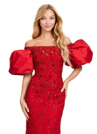 Make a statement with the Ashley Lauren 11432 long prom dress. Sparkling beads cover this off shoulder gown, featuring puff sleeves for a touch of drama. Perfect for formal events and pageants. Expertly crafted with quality materials for a luxurious feel. This fully beaded gown features taffeta puff sleeves that add the perfect amount of glam. The intricate bead pattern brings the entire look together.