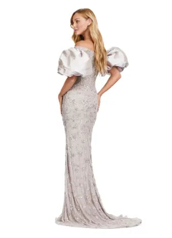 Make a statement with the Ashley Lauren 11432 long evening dress. Sparkling beads cover this off shoulder gown, featuring puff sleeves for a touch of drama. Perfect for formal events and pageants. Expertly crafted with quality materials for a luxurious feel. This fully beaded gown features taffeta puff sleeves that add the perfect amount of glam. The intricate bead pattern brings the entire look together.