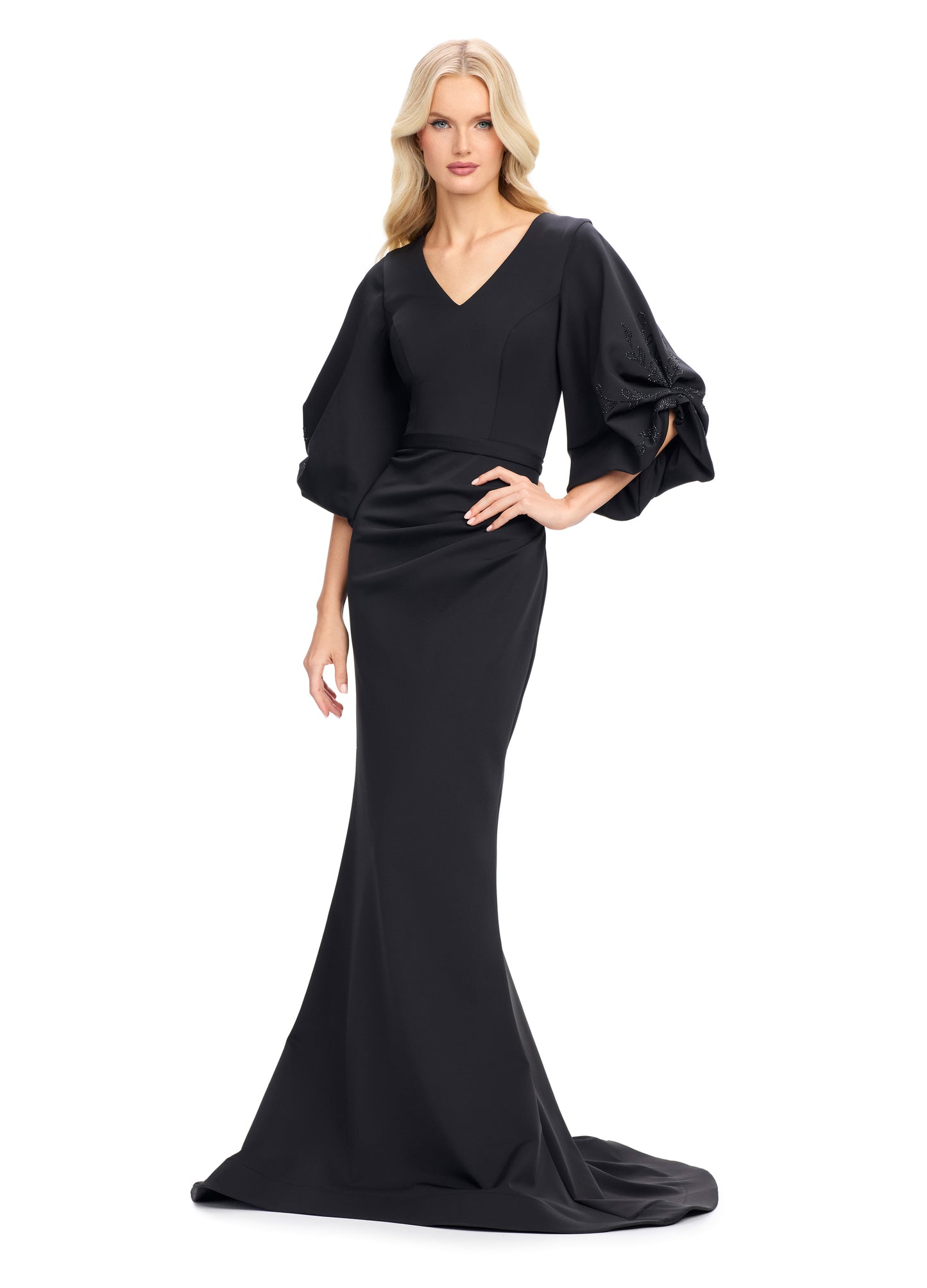 Elevate your evening look with the stunning Ashley Lauren 11740 Long Gathered Sleeves Evening Gown. The scuba fabric provides a sleek and comfortable fit, while the belted waistline accentuates your figure. The gathered sleeves add an elegant touch to this chic gown, making it perfect for any special occasion.