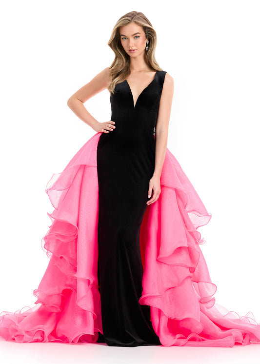 Make an unforgettable entrance in ASHLEYlauren Style 12049, a dramatic ball gown featuring a plush velvet bodice and layered organza ruffle skirt. With a plunging V-neckline and deep V-back, this gown blends structure with fluid movement, perfect for pageants, galas, and red carpet events.

Available in Black/Hot Pink, Royal/Turquoise
Ideal for Pageants, Galas, Red Carpet Events
Velvet Bodice with Plunging V-Neckline, Deep 