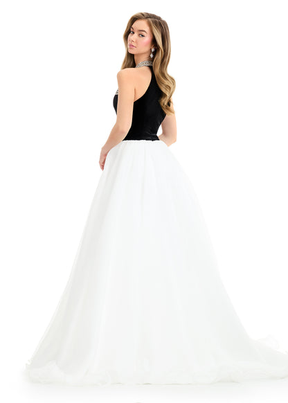 Make a grand entrance in the ASHLEYlauren Style 12050 velvet and organza ball gown. Featuring a beaded halter neckline on a velvet bodice, this gown flows into a full organza skirt with a dramatic train, perfect for proms, pageants, and formal occasions.

Available in Royal, Black/Ivory
Velvet Halter Neck Ball Gown with Organza Skirt and Train
Ideal for Proms, Pageants, Formal Events

Structured velvet bodice with delicate beadwork and a voluminous organza skirt designed for elegance and impact.