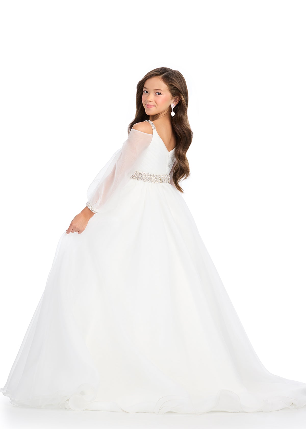 Ashley Lauren 8273 Girls Ivory White Organza pageant dress will make your little one feel like a true princess. Featuring a stunning long sleeve ballgown design, this dress is made from high-quality organza fabric and also features an elegant off the shoulder neckline. Give your child a look that will stand out and make them feel confident and beautiful.