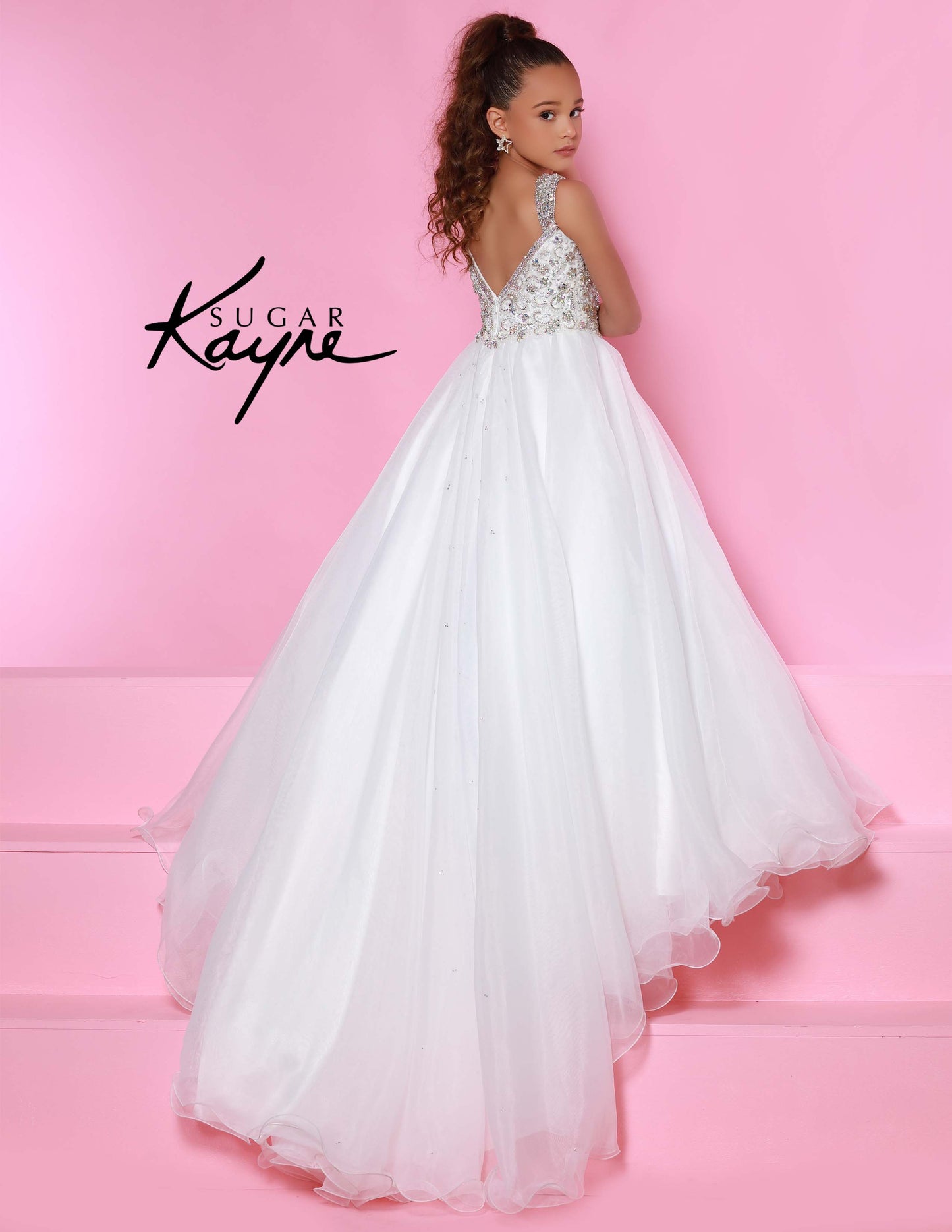 Sugar Kayne C146 Girls Pageant Dress.&nbsp; This lush pageant ballgown is made of flowy organza fabric.&nbsp; The top is embellished with semi sweetheart neckline and cap sleeves.&nbsp; Float on the stage in this full flowy pageant ballgown for girls and preteens.

Colors:&nbsp; Barbie Pink, Orange, Periwinkle, Royal, Turquoise, White

Sizes:&nbsp; 2-16

(Sizes 2-6 do not have bust cups, Sizes 8-16 will have preteen size bust cups)

Fabric:&nbsp; Organza, Mesh, Stretch Lining&nbsp;