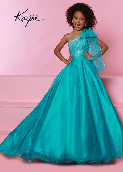 Sugar Kayne C310 Girls and Preteens One Shoulder bodice with a Bow on the shoulder A Line Shimmer Pageant Dress Crystal Gown&nbsp;
Go ahead and take a BOW in this lovely one-shoulder organza ballgown. The ombre beaded bodice brings all the dazzle!

Colors:
Orange, Yellow, Blue, White, Neon Pink

Sizes:
2, 4, 6, 8, 10, 12, 14, 16

Fabric Organza, Mesh, Satin Lining

(Sizes 2-6 do not have bust cups, Sizes 8-16 will have preteen size bust cups)